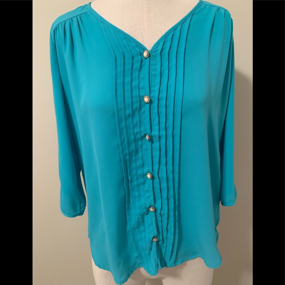 Francesca’s teal faux- button down